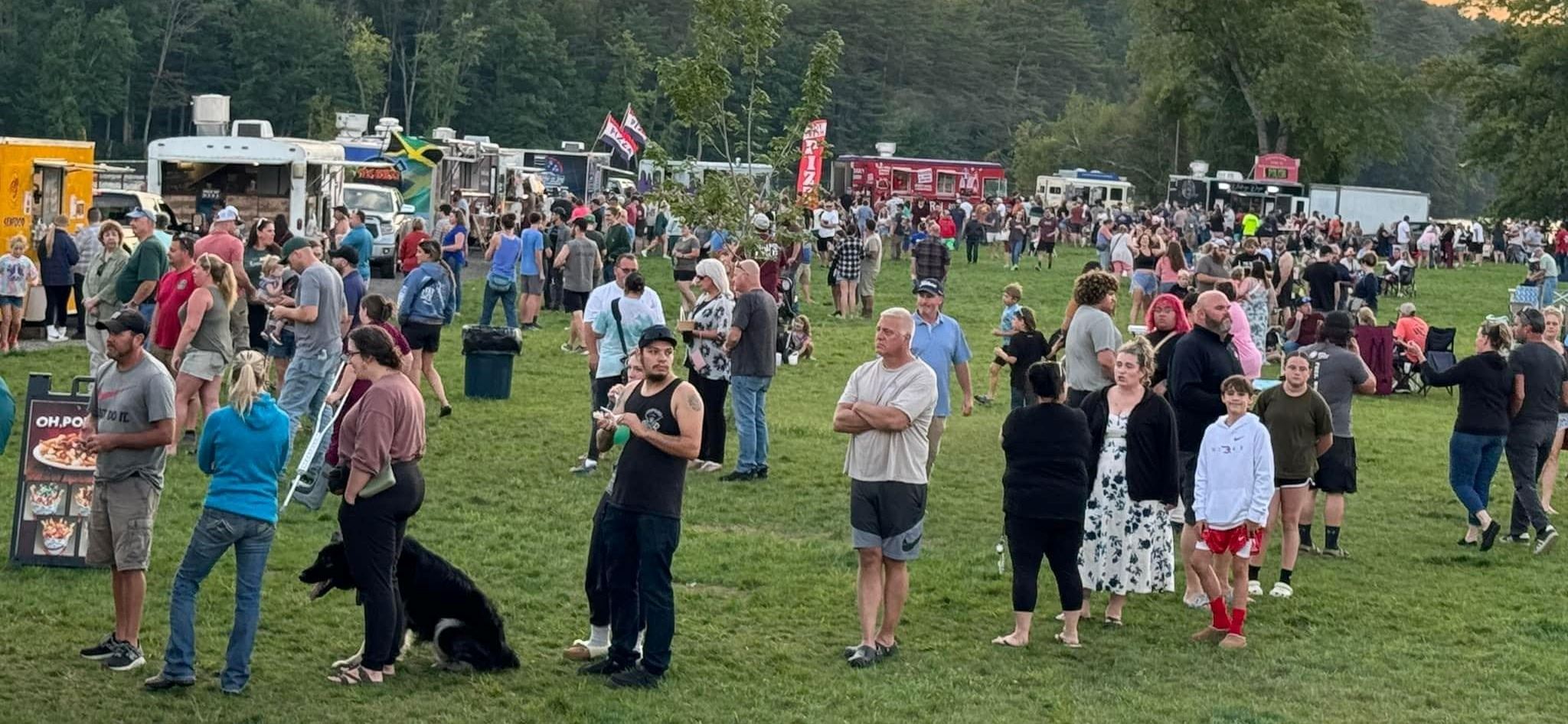 Photo of Food trucks and crowds